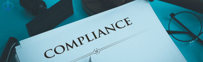 COMPLIANCEと書かれた紙のイメージ画像