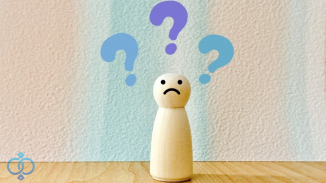 はてなマークと人形